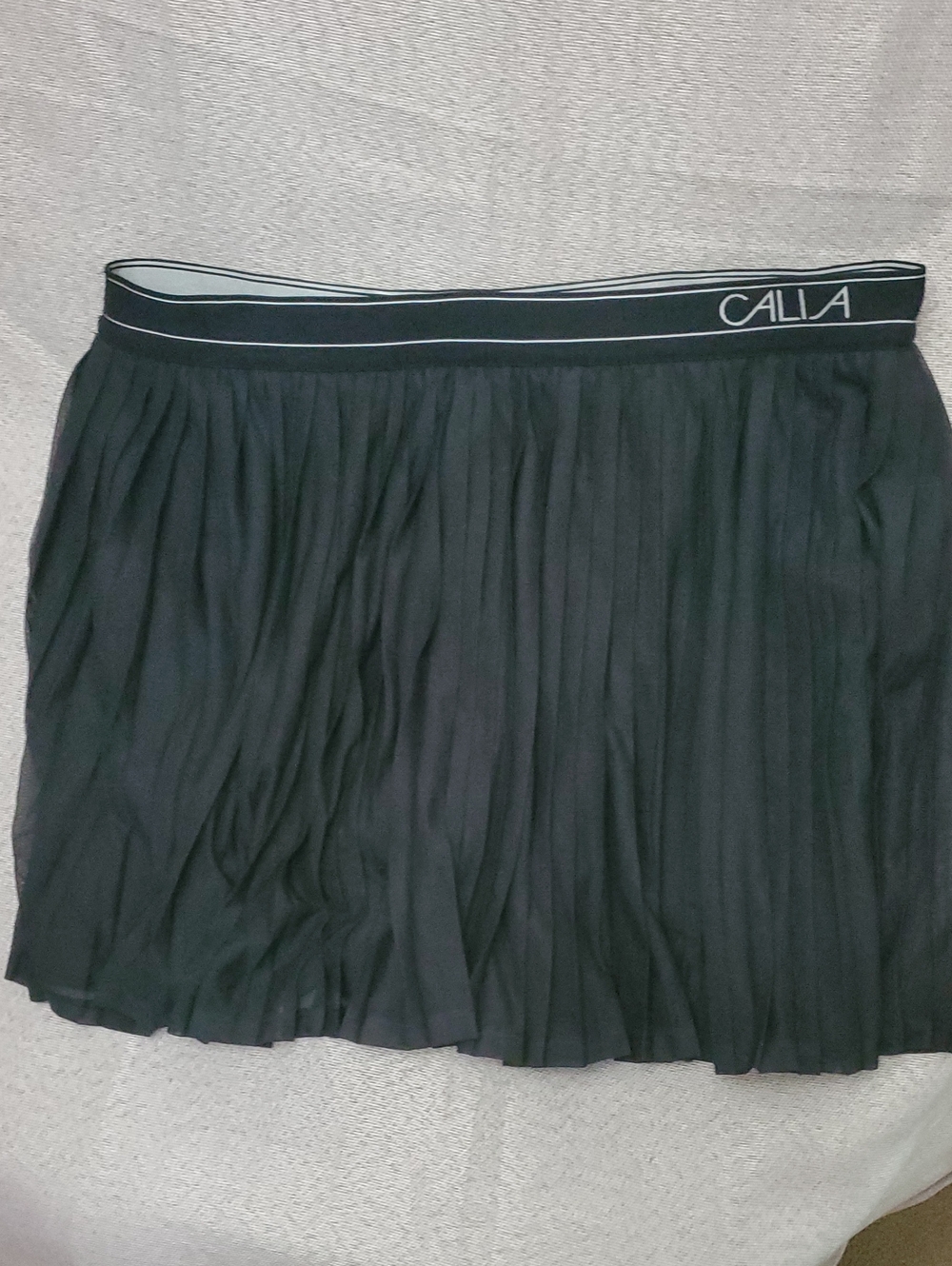 Calia Black Pleated Mini Skirt with Branded Waistband